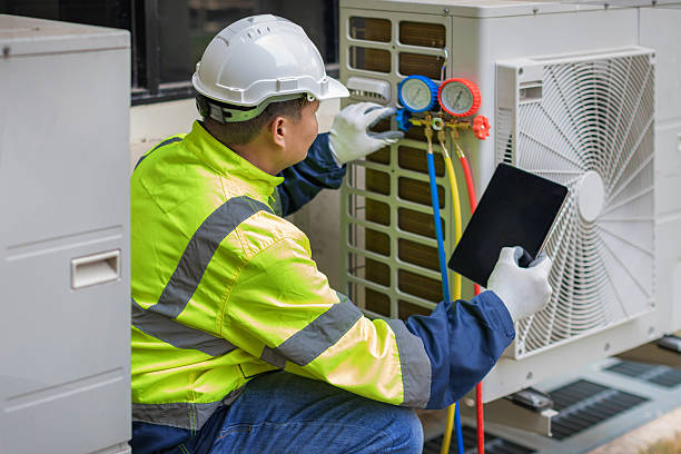 Professional Air Conditioning Repair technician working in Adelphia, NJ